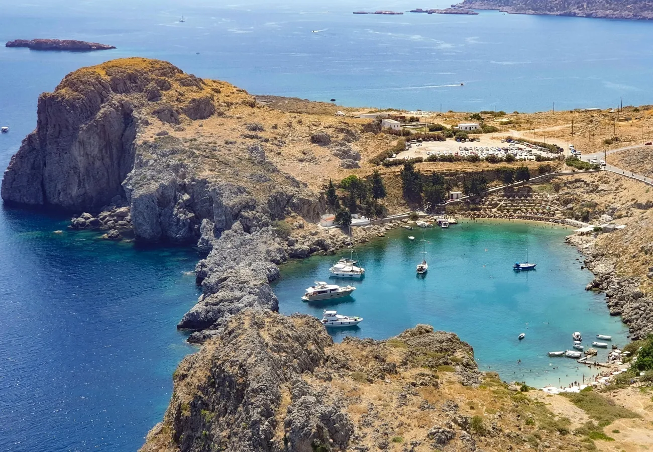 sun-bright beach in Rhodes near Aulus Lindos luxury resort