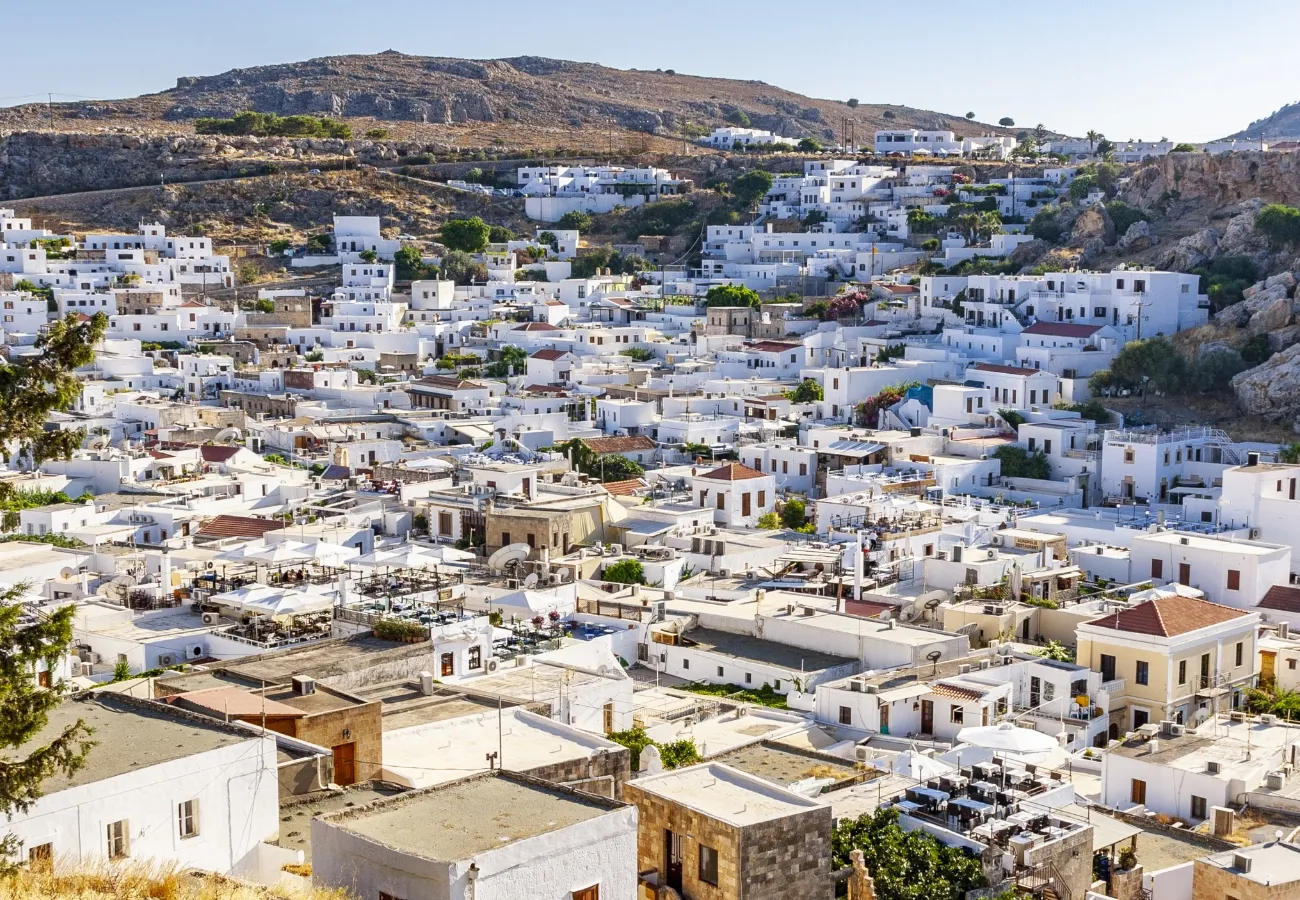 Whitewashed village streets in Rhodes for family exploration from Aulus Lindos Rhodes