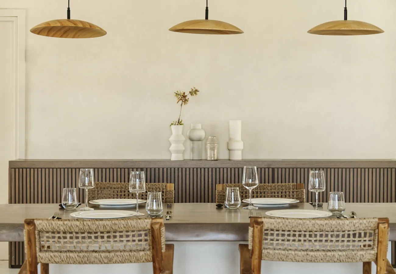 Meze restaurant at Aulus Lindos Resort in Rhodes showcasing elegant dining tables and authentic Greek dishes