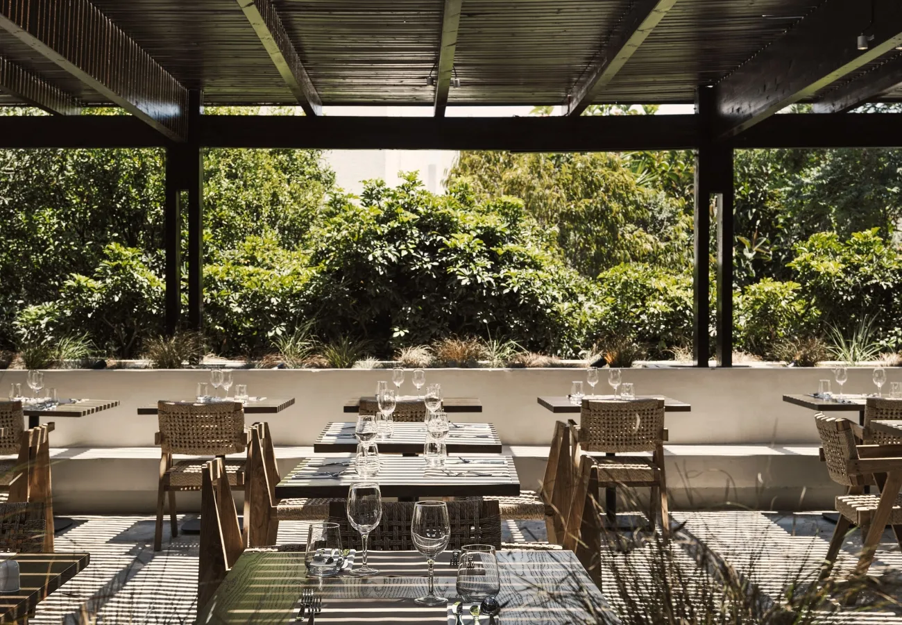 The Island buffet restaurant at Aulus Lindos Resort in Rhodes featuring a variety of dishes and stylish interior design