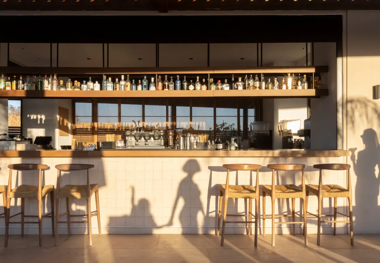 The Spritzeria lounge with themed nightly creations and vibrant atmosphere at Aulus Lindos Rhodes