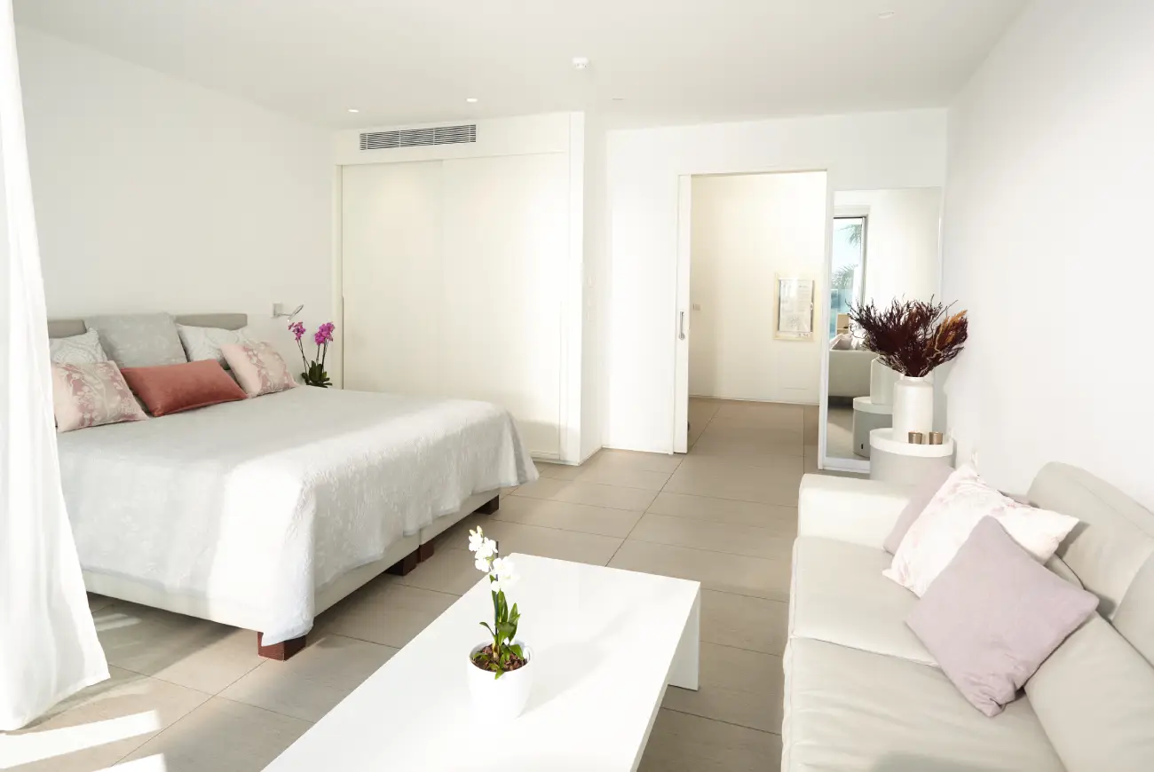 Bright Emerald One Bedroom Suite at Baobab Suites featuring bedroom and living area