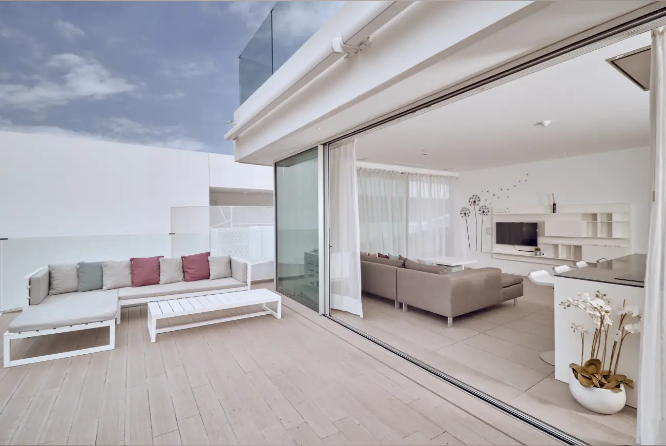 Private terrace of Emerald Two Bedroom Suite with outdoor seating and inland views.
