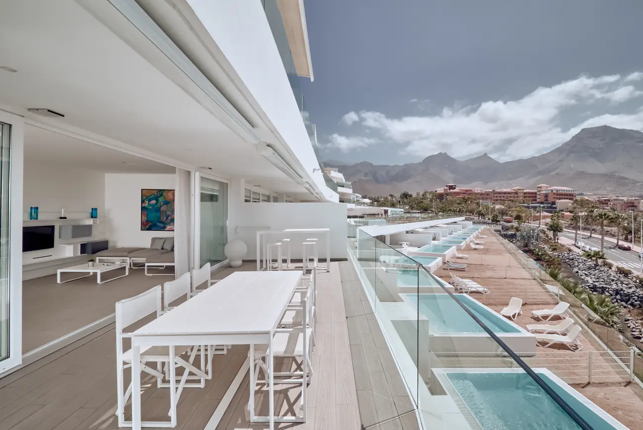 Jade One Bedroom Suite with Side Sea View terrace with outdoor dining area and side sea view