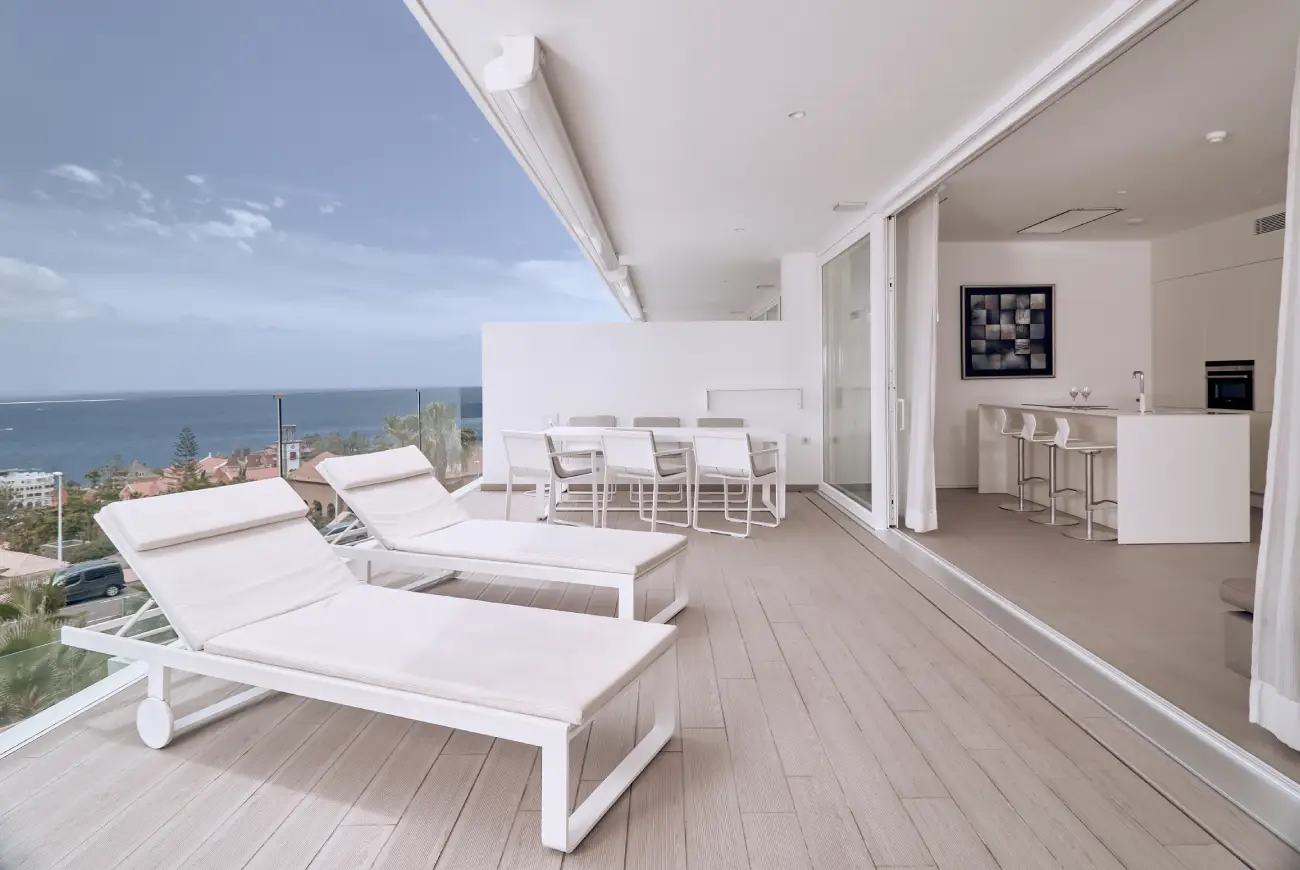 Jade One Bedroom Suite with Side Sea View open-plan living area with terrace and side sea view