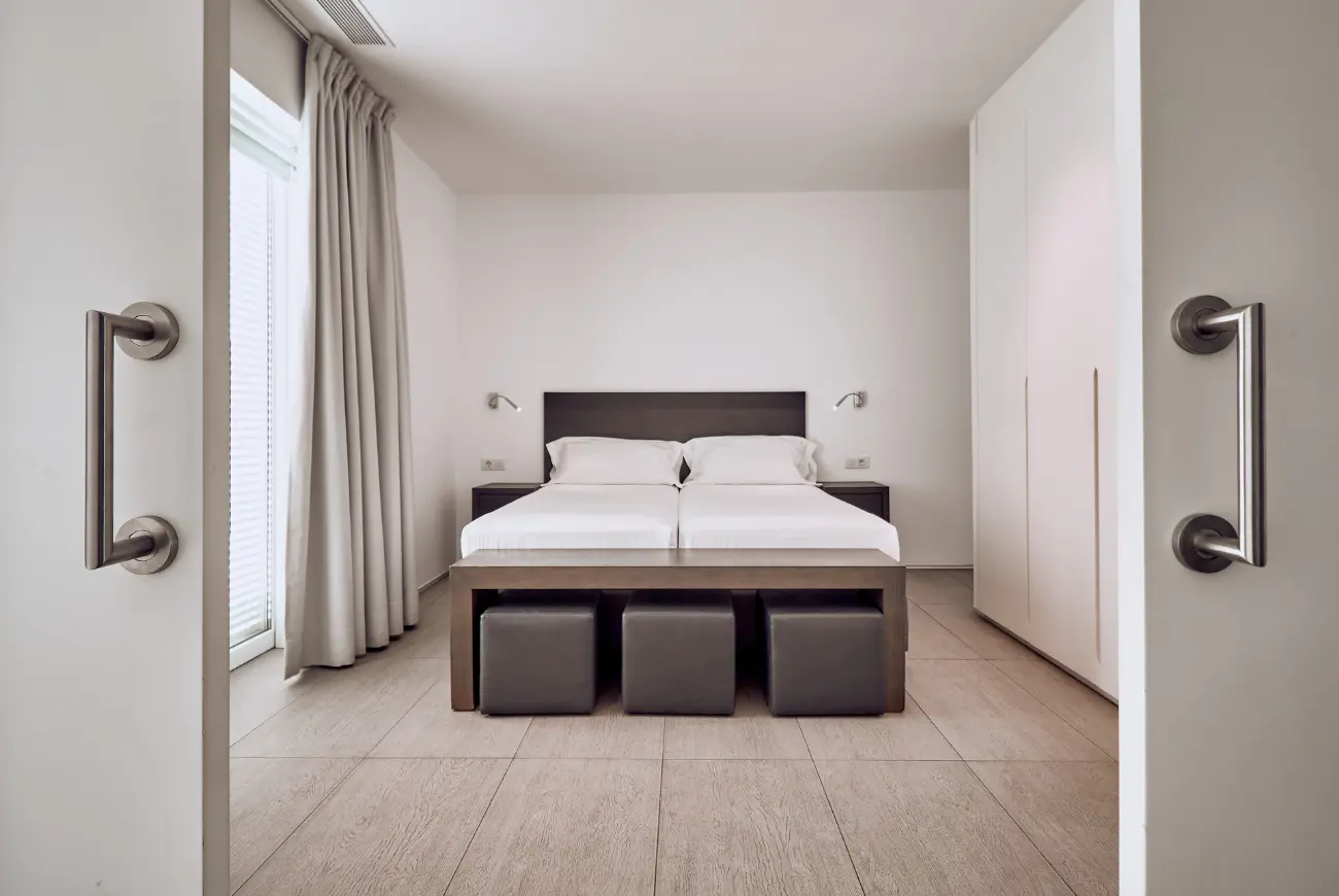 Sapphire Two Bedroom Suite with Sea View master bedroom with king bed