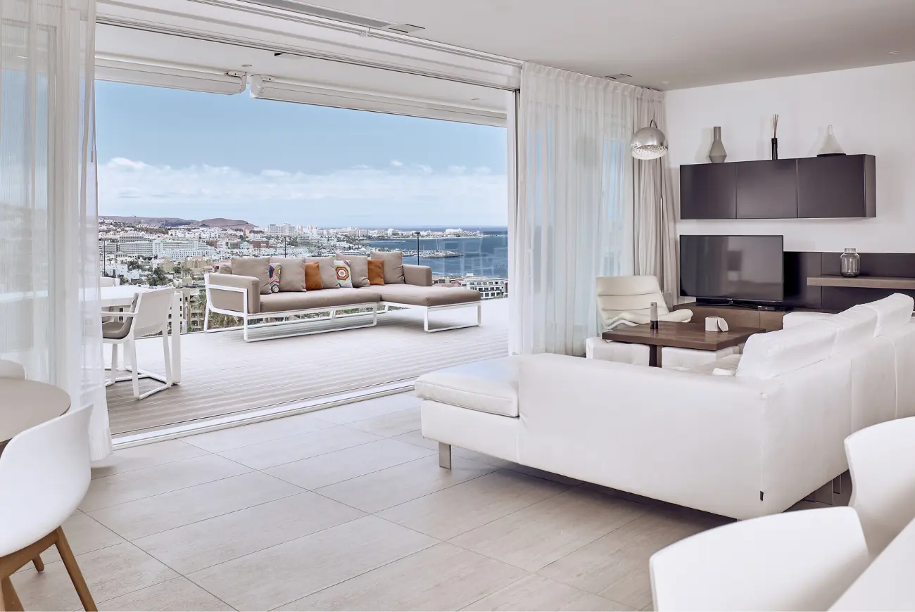 Sapphire Two Bedroom Suite with Sea View living room with sea view and furnished terrace