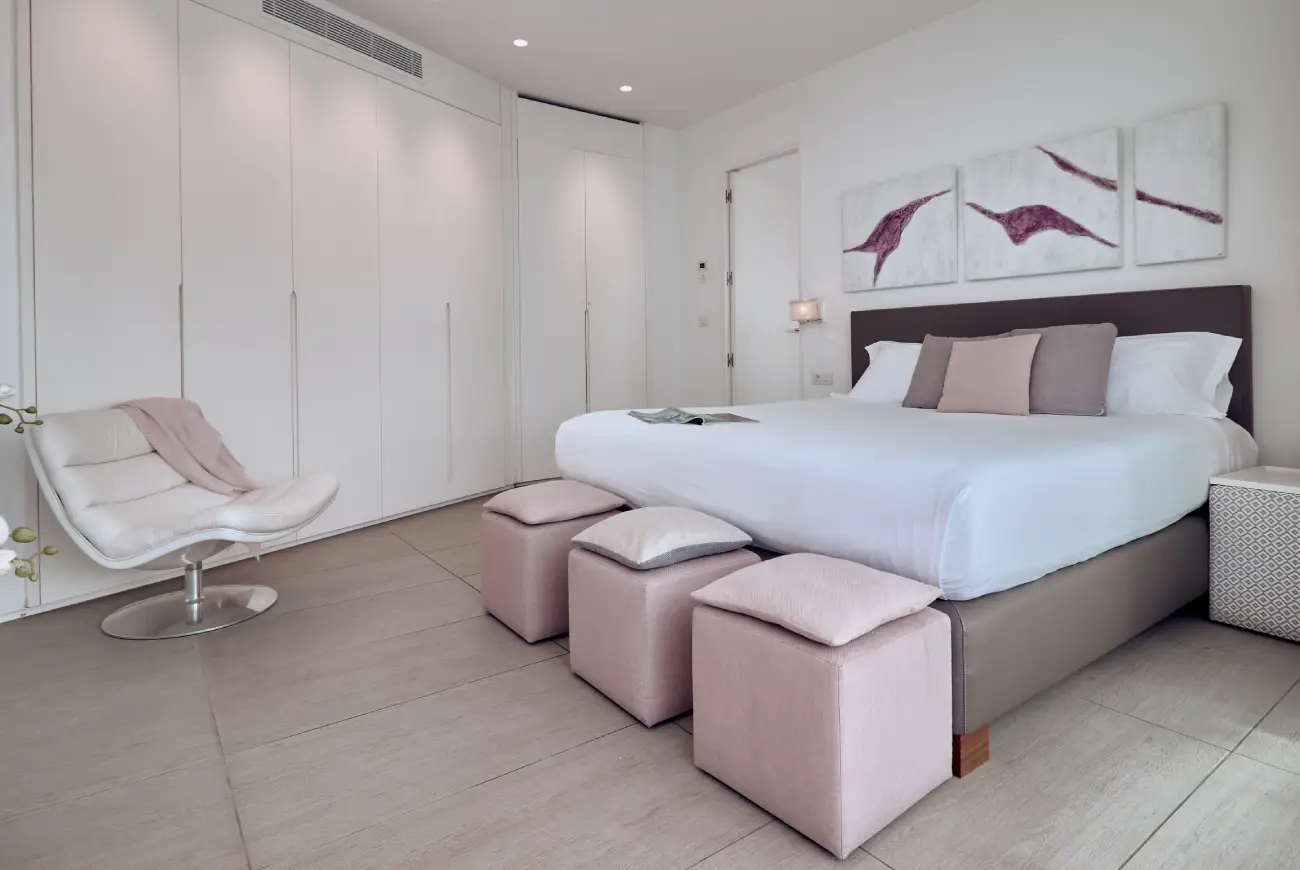 Sapphire One Bedroom Suite with Sea View and Private Pool bedroom with king bed and contemporary décor