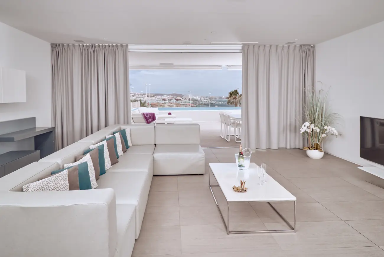 Sapphire One Bedroom Suite with Sea View and Private Pool living room with sofa and sea view
