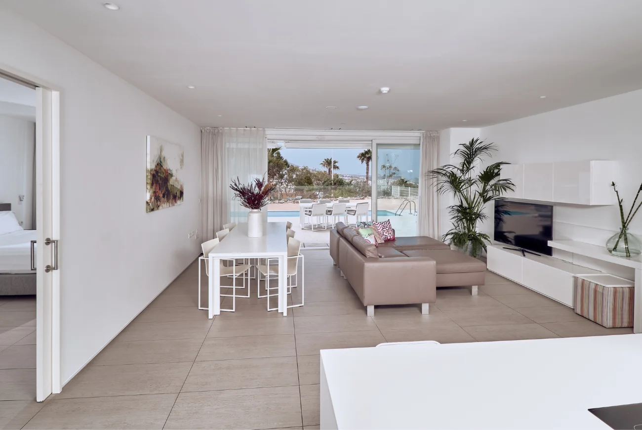 Jade Three Bedroom Suite with Side Sea View and Private Pool living room with sofa and terrace access