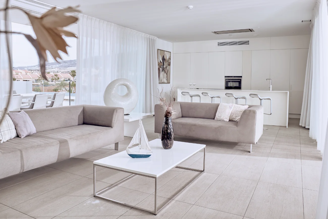 Sapphire Two Bedroom Suite with Sea View and Jacuzzi living room with sofa and seating area