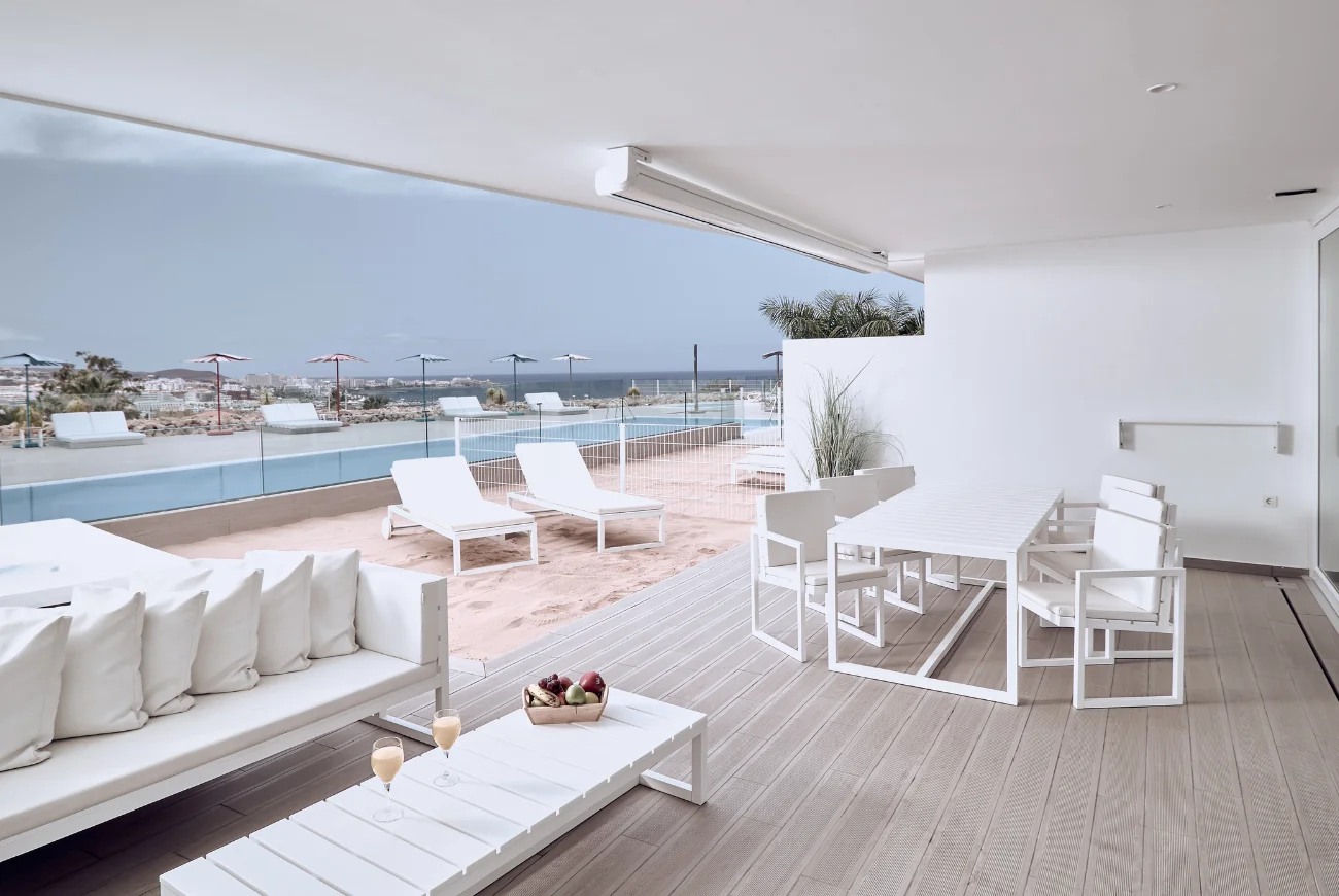 Sapphire Two Bedroom Suite with Sea View and Jacuzzi furnished terrace with sun loungers and sea view