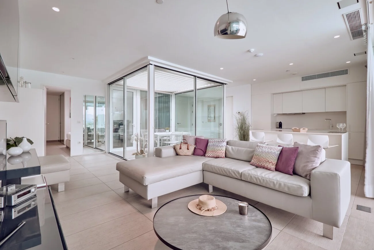 Sapphire Two Bedroom Suite with Sea View and Private Pool dining area with floor-to-ceiling windows