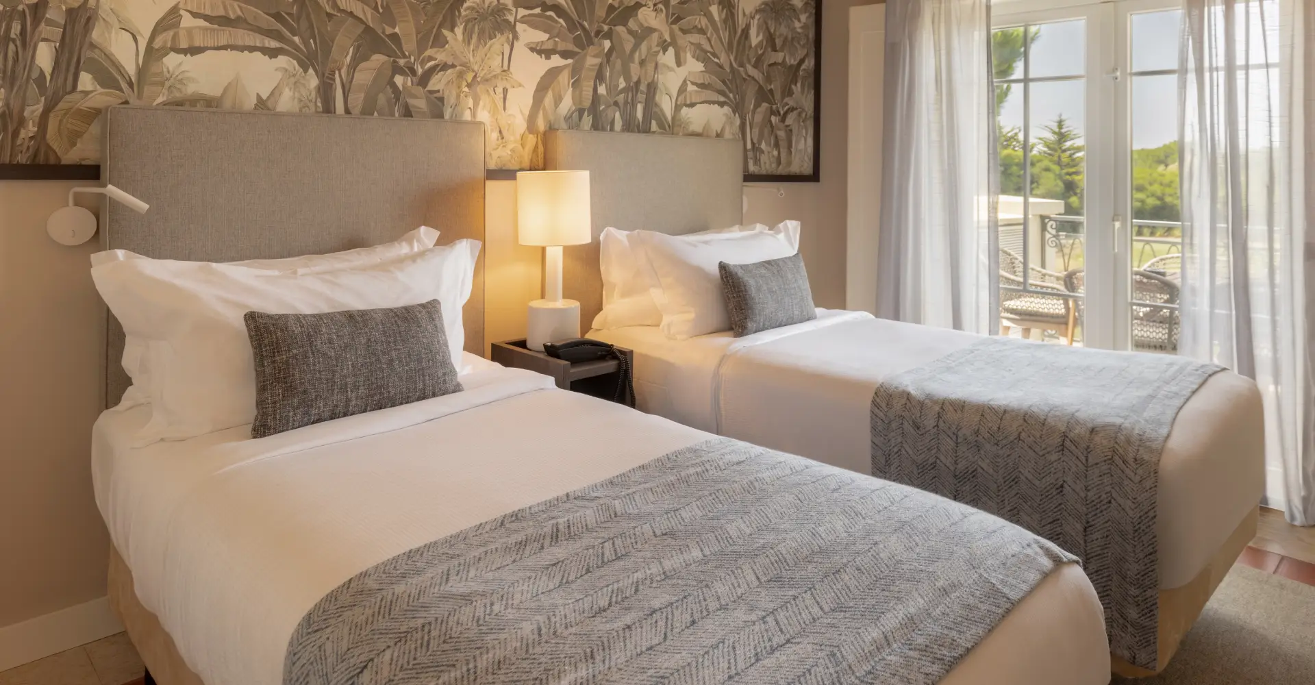 Twin beds in the second room of the residence