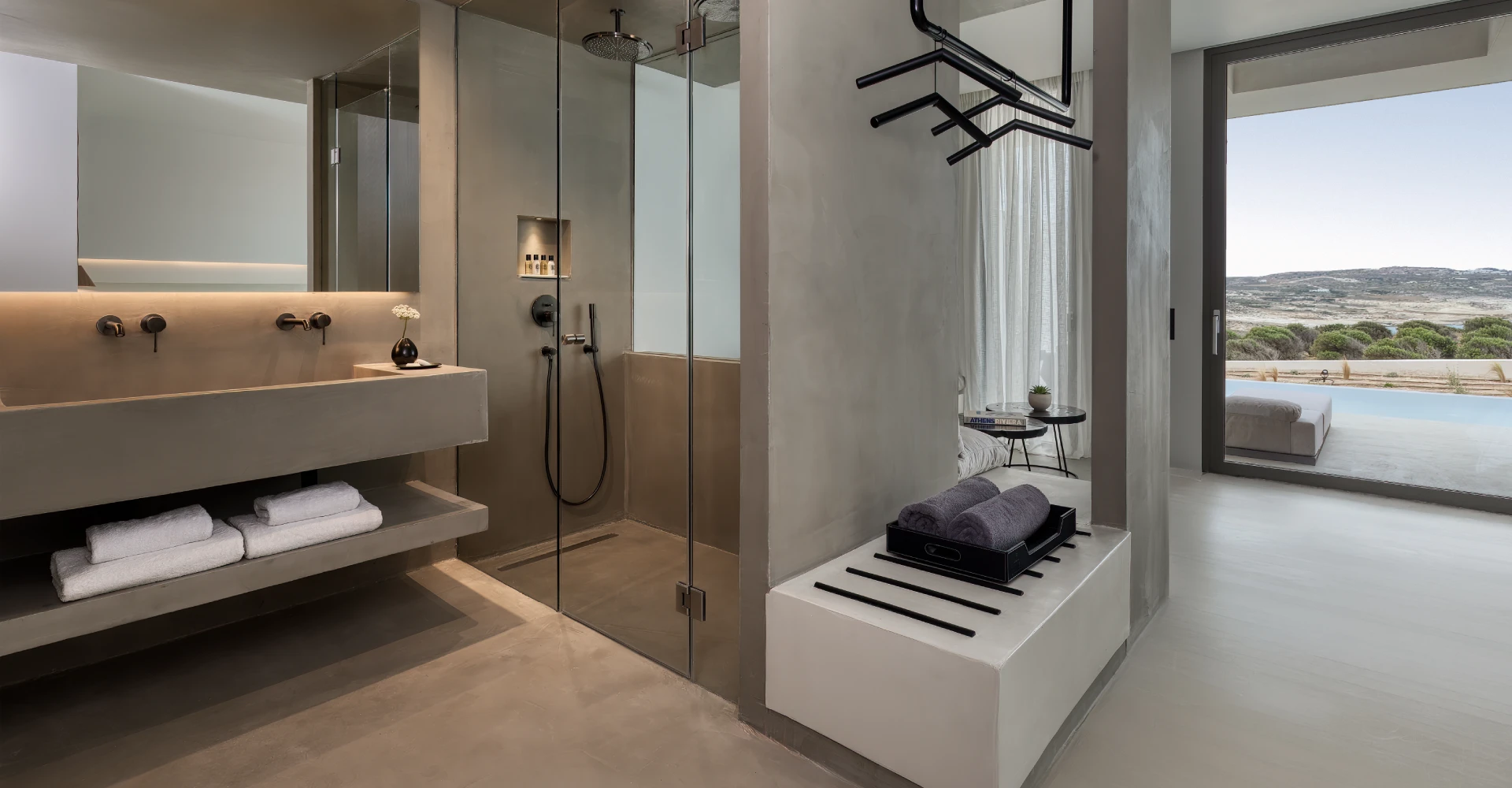 Luxury suite with open space shower bathroom and spacious interior overlooking an oversized balcony at Domes White